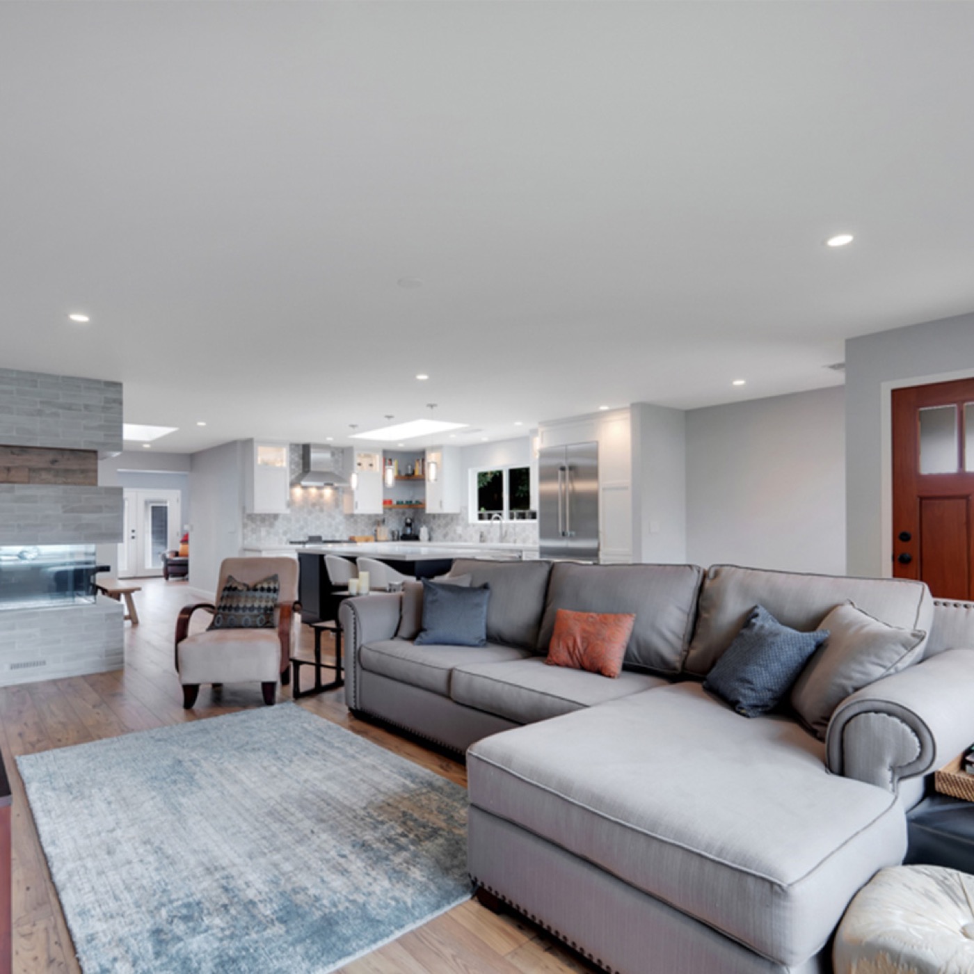 Open-concept living room and kitchen in a remodeled Bay Area home